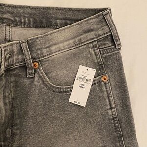 Gap NWT Vintage Slim Mid-Rise jeans. Washed black. Distressed. Size 29 long